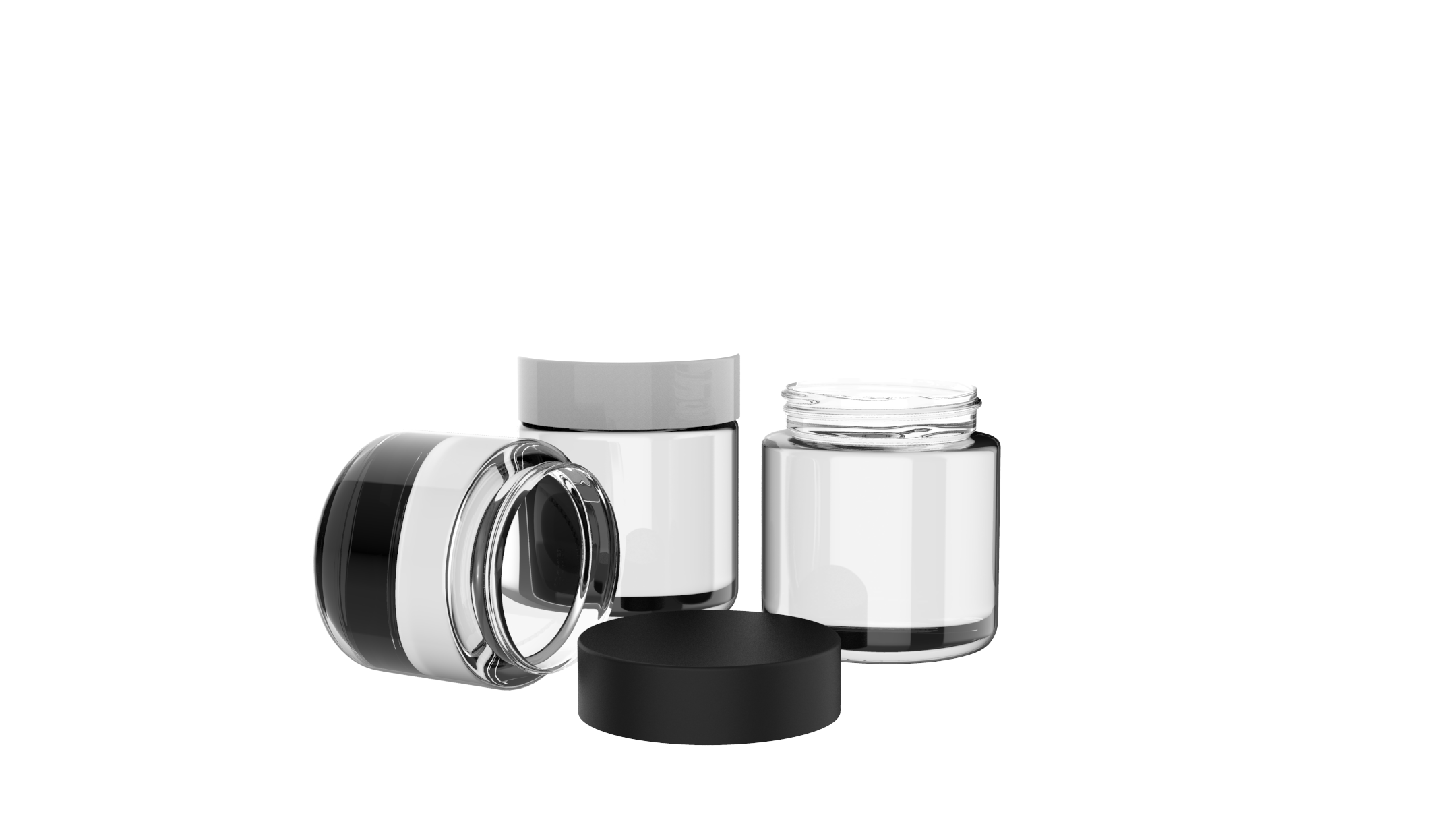 Three clear glass jars with white labels and black and silver lids